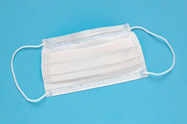 istock Coronavirus / Corona virus concept. Procedure mask from bacteria. Protection concept. 1210460840