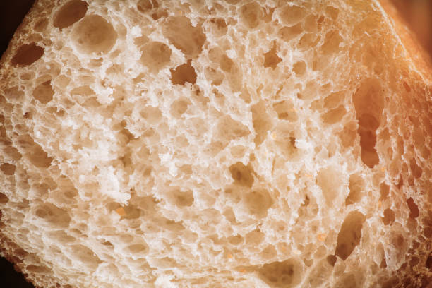 istock Freshly baked baguette bread on the rustic background 1210466251