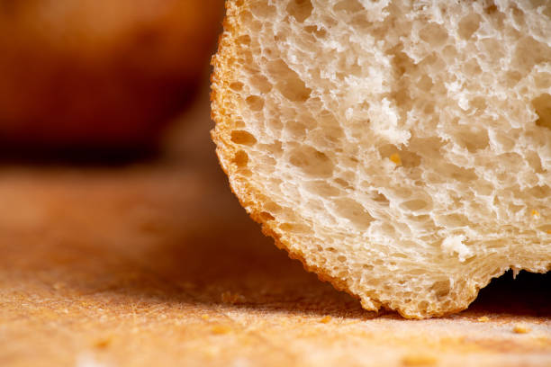 istock Freshly baked baguette bread on the rustic background 1210466255