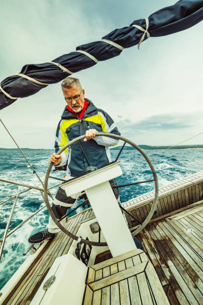 istock adventure man sailing on Aadriatic sea 1210467016