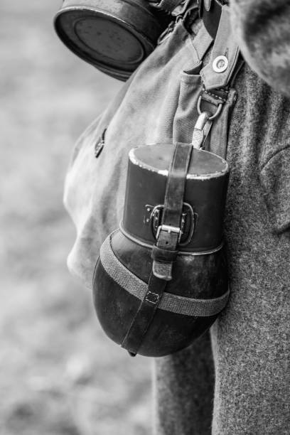 istock German military soldier drinking water flask WWII 1210478521