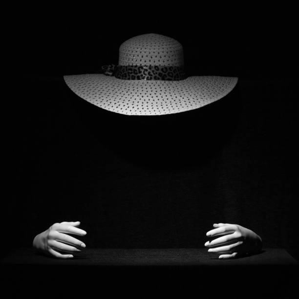 istock Ghost of a woman in a straw hat with space for design. 1210482303
