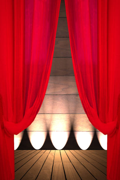 istock Theater stage lit by spotlights 1210484324
