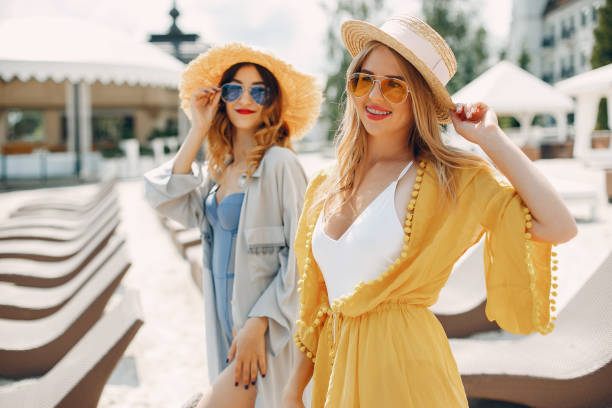 istock Two elegant girls on a resort 1210485402