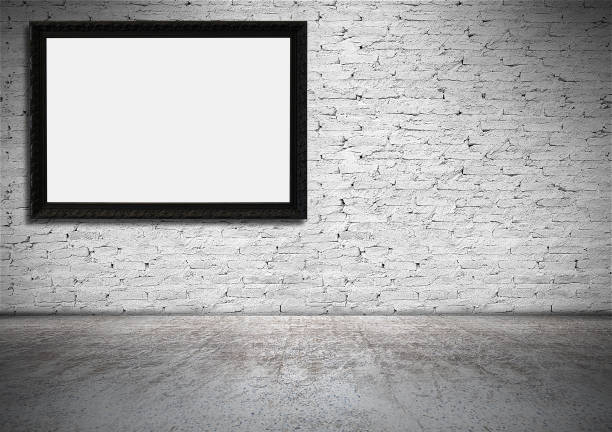 istock Vintage black frame on old white brick wall. 1210485690