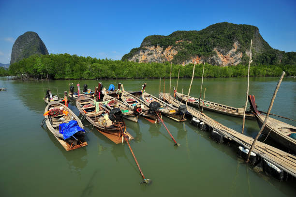 istock Fishing Boats background  the mountain view. 1210487967
