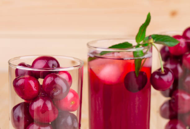 istock Still life with cherry juice with cherries. 1210488954