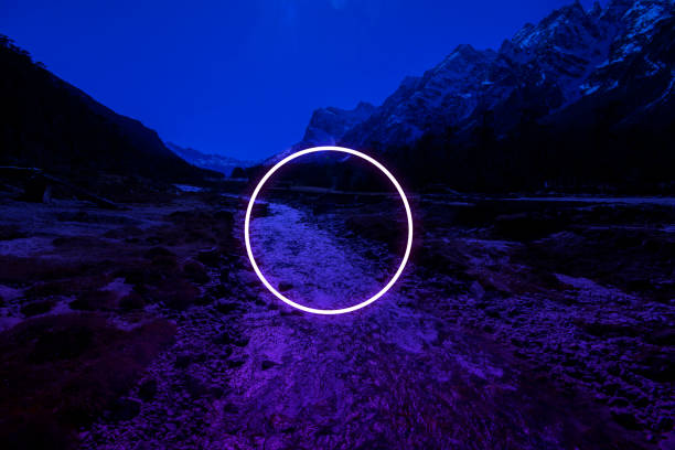 istock Mountains in night time and circular neon light on stream, fantasy image 1210492808