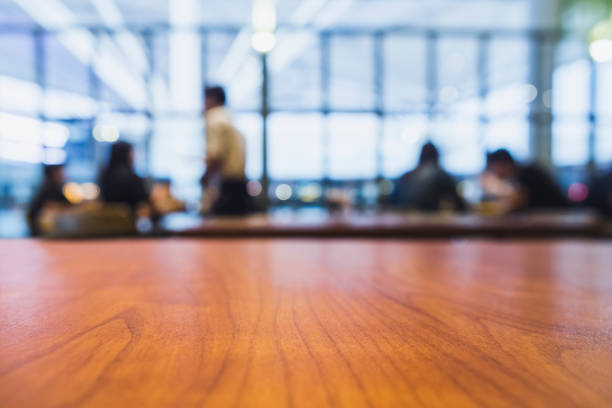 istock Table top Counter with People cafe Shop interior Blur background 1210494061