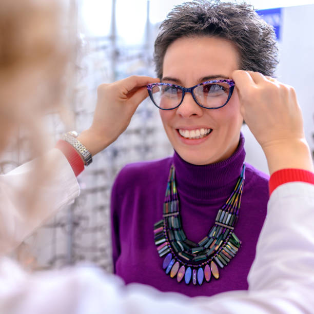 istock Choosing glasses at the optician 1210496242