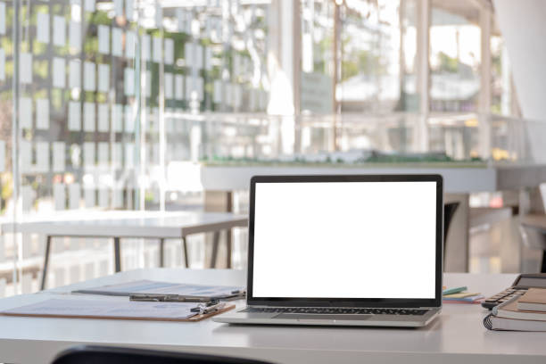 istock modern office workspace desk with blank screen laptop computer and office supplies 1210496644
