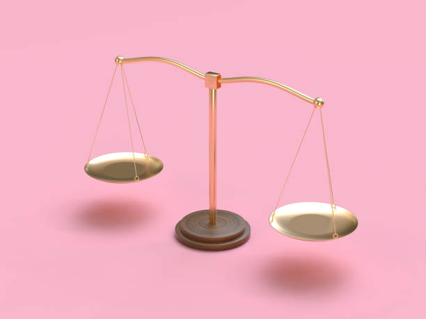 istock gold balance scale pink scene 3d rendering 1210501686