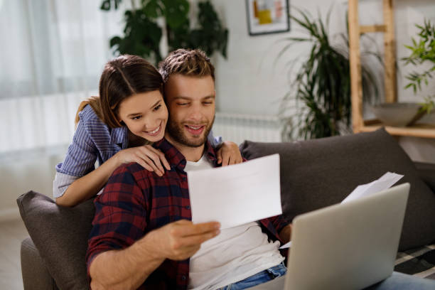 istock Coming up with a plan to maintain their household budget 1210502933