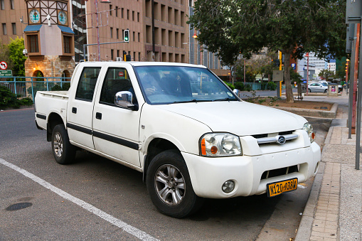 Windhoek, Namibia - February 11, 2020: White pickup truck Great Wall Sailor in the city street.