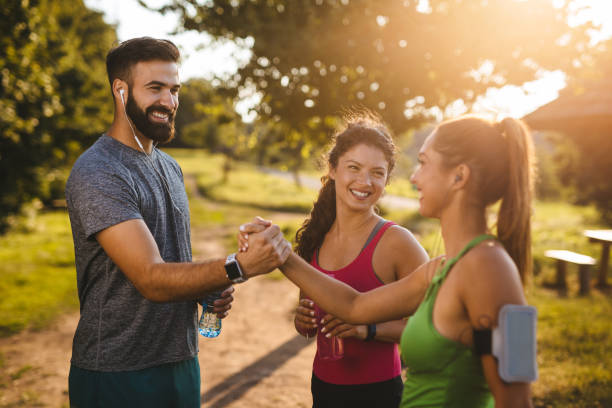 istock Young couple giving each other high five after a workout 1210506204