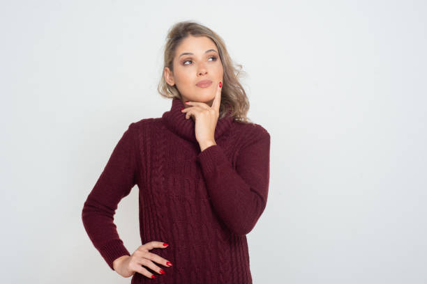 Pensive young woman looking aside