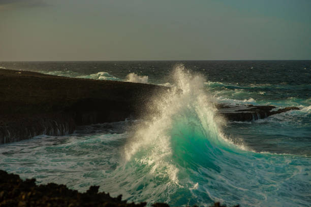 istock Power of the atlantic ocean. Huge wave close to cliff 1210506706