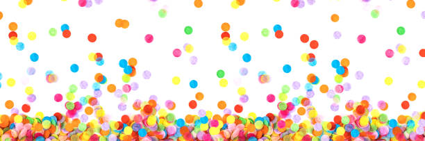 istock Banner made from multicolored confetti isolated on white background. 1210507600