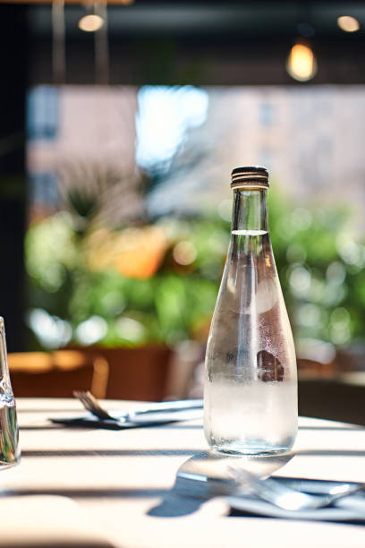 istock Bottle of water on the table 1210508133