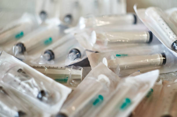 istock a pack of unopened syringes . Sealed syringes lie on a textured surface 1210509326