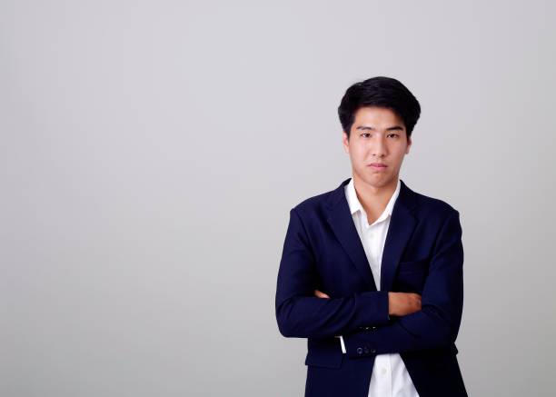 istock Young Asian businessman white background 1210510468