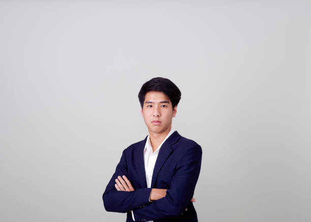 istock Young Asian businessman white background 1210511086