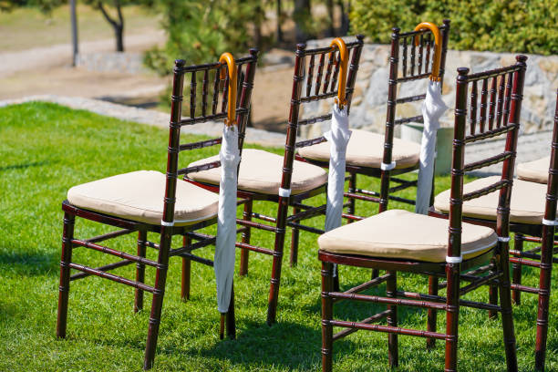 istock Rows of chairs for guests at an open-air wedding ceremony. 1210511121