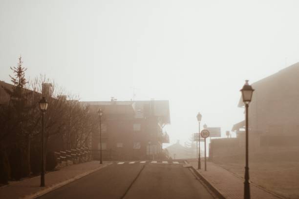 istock street with fog 1210513823