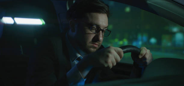 istock Sleepy man driving at night 1210515915