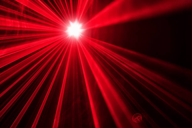 istock Vivid red laser light  beams in club as background 1210516866