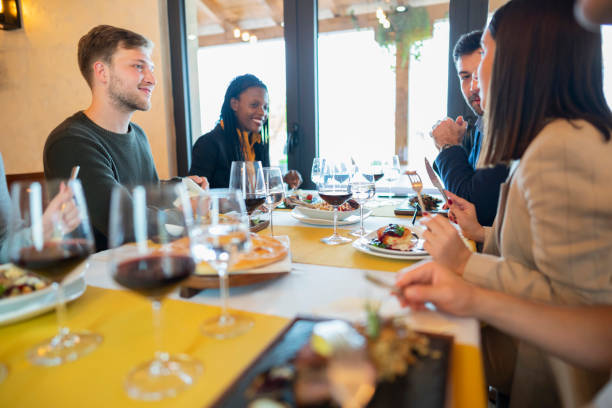 istock Enjoying good food and drink together 1210518954