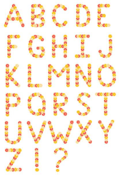 istock Alphabet made from sliced citrus fruits. Oranges, grapefruits. Isolated on a white background 1210520336