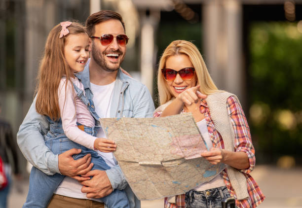 istock Happy young family of three smiling while spending time together 1210521732