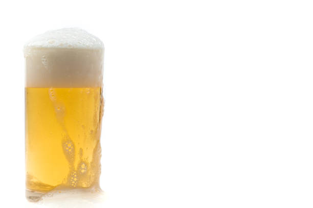 istock Frosty glass of light beer isolated on white background. 1210521744