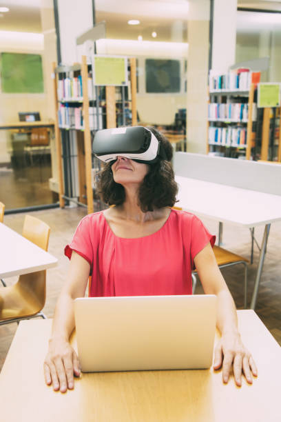 istock Happy adult student excited with VR experience 1210522160