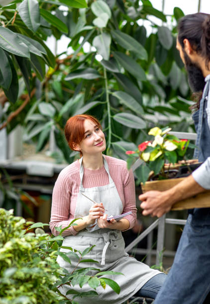 istock Two People working at the botanical garden 1210524166