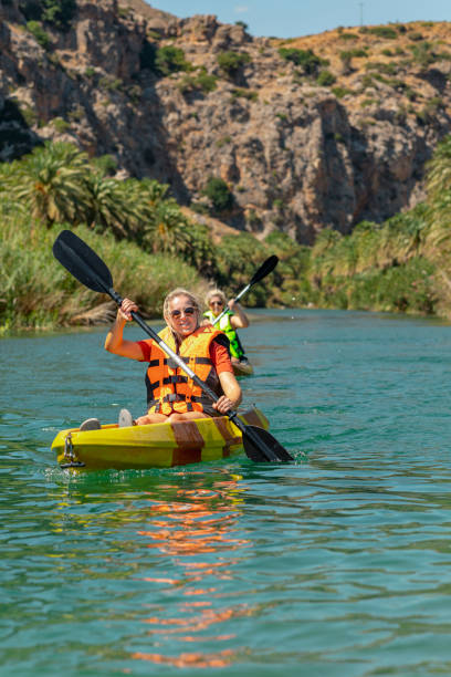 istock Women Kayaking on the River 1210524996