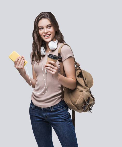 istock Happy student girl using smart phone 1210525256