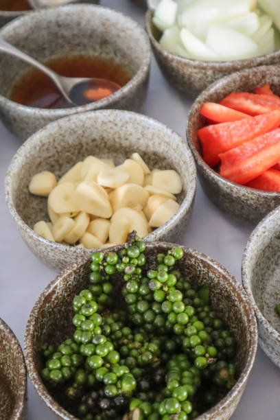cooking with fresh Asian Ingredients cooking class with fresh Asian Ingredients in bowls kampot stock pictures, royalty-free photos & images