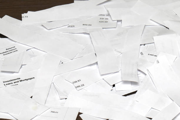 istock Hiding overdrafts and mortgage debts on papers 1210526726