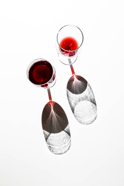 Two glasses of wine from above with shadows
