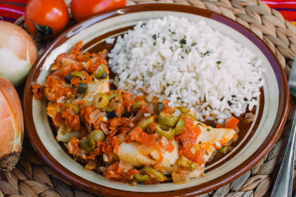 ペスカード・ア・ラ・ベラクルサナはメキシコの伝統的なレシピです。魚の食べ物は通常米と一緒に提供されています,それはベラクルスのメキシコの状態から来ています - veracruz ストックフォトと画像
