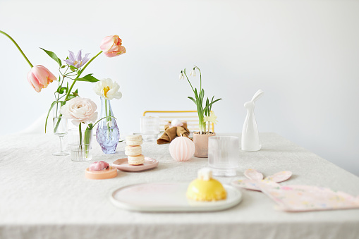 Pastel color easter table decoration with a sweet Easter bunny