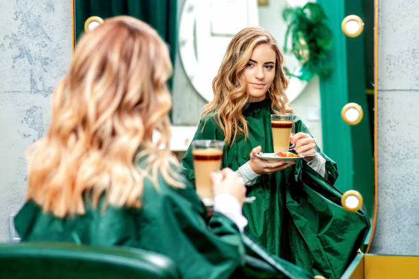 istock Young woman having cup of coffee. 1210532823