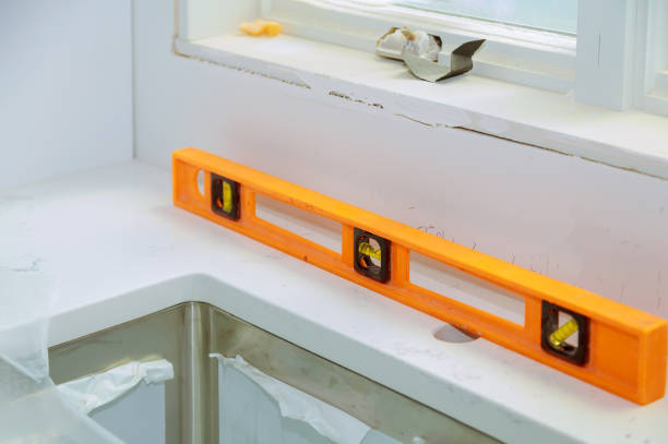 istock Leveling with countertops of making a modern domestic kitchen cabinets 1210538435