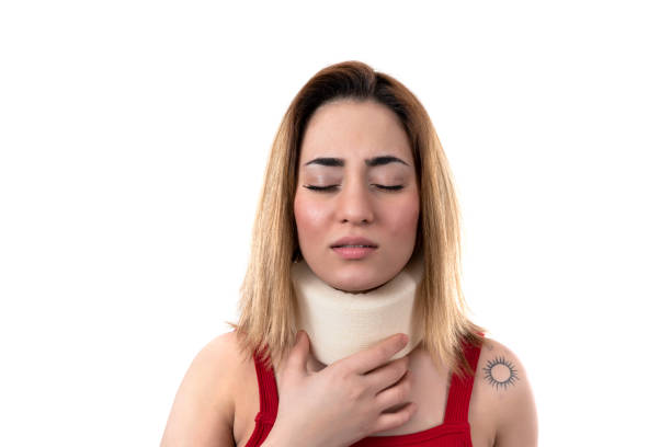 istock young woman with a neck brace 1210539641