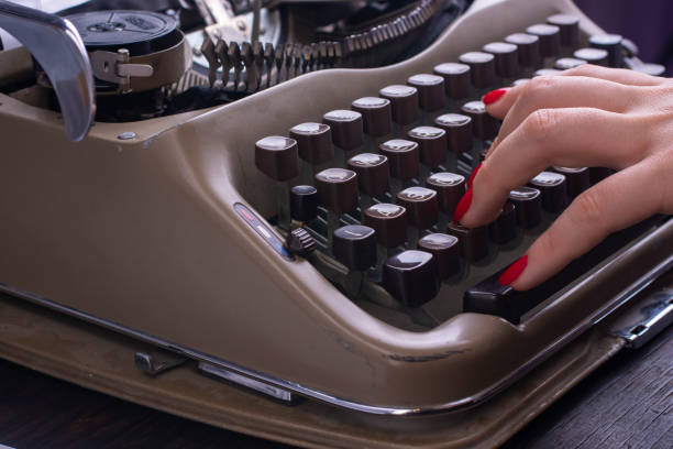 istock The typist is typing on a typewriter. Close-up. 1210539683