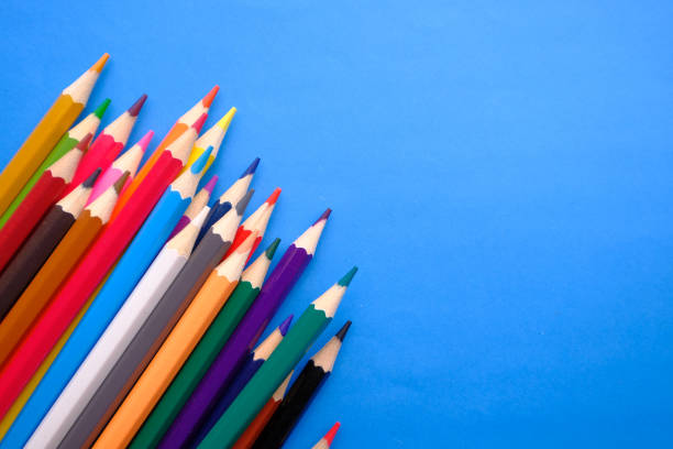 istock colorful pencils on color background, close up 1210541463