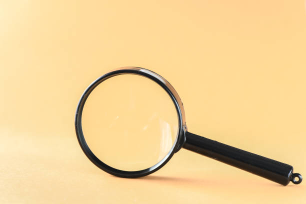 istock close up magnifier glass on a light  background 1210541570