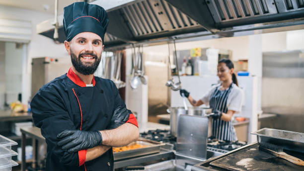 istock Portrait of confident chef at restaurant working 1210541625